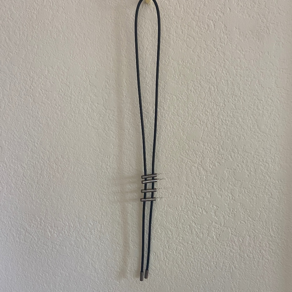 Leather and metal bolo necklace